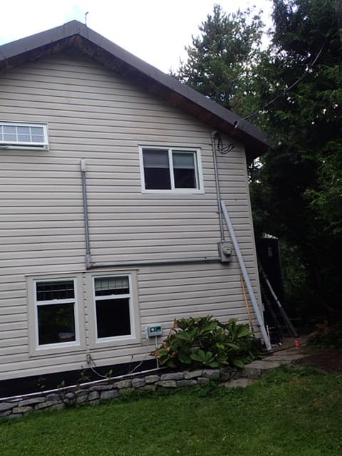 Back sprinkler of two plus in-ground garden sprinklers